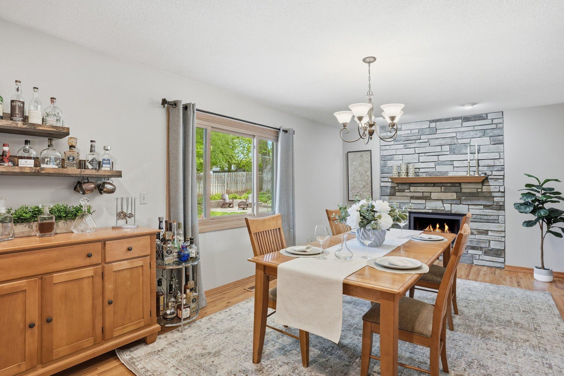 "Elegant dining meets fireside warmth."