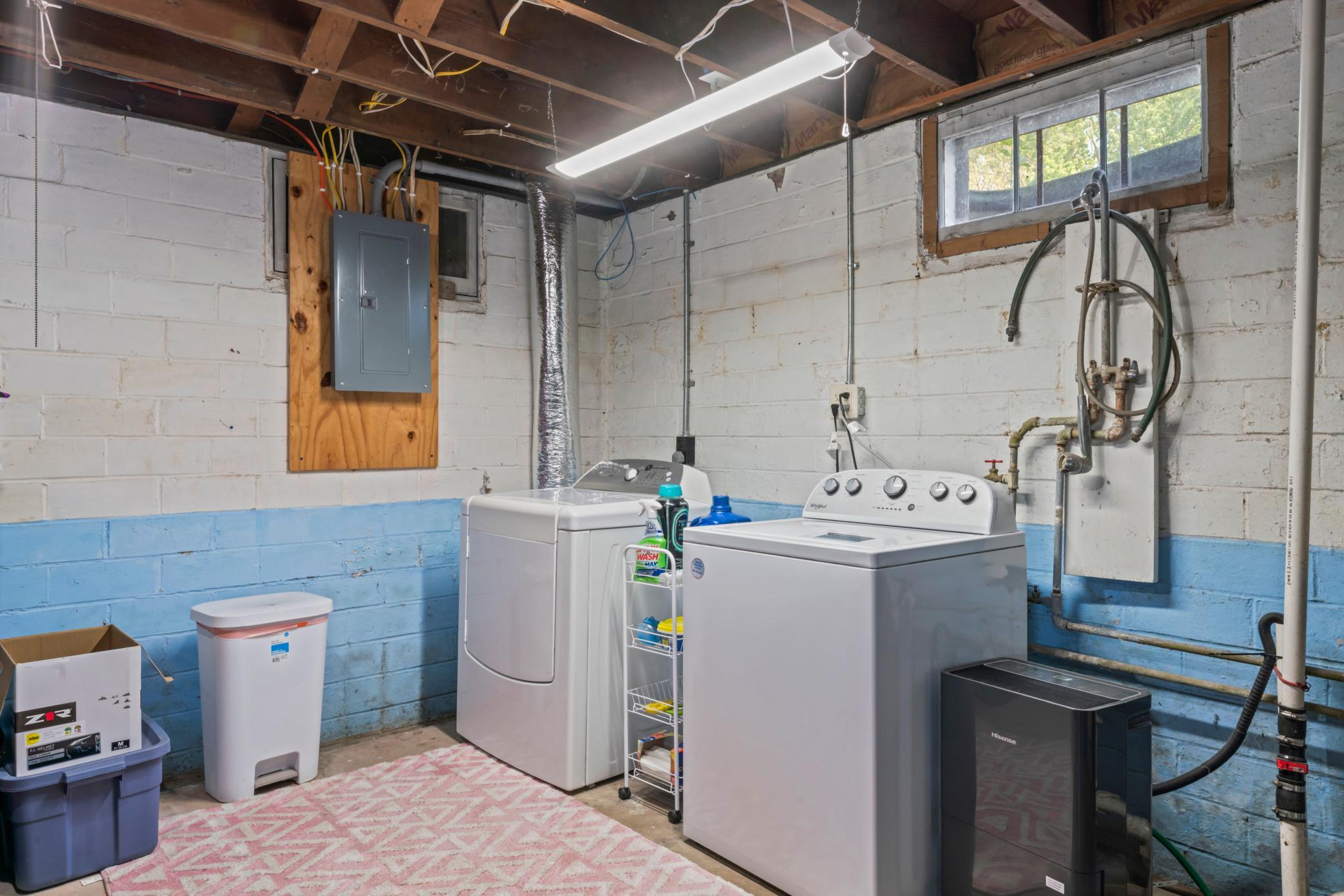 Laundry in unfinished basement
