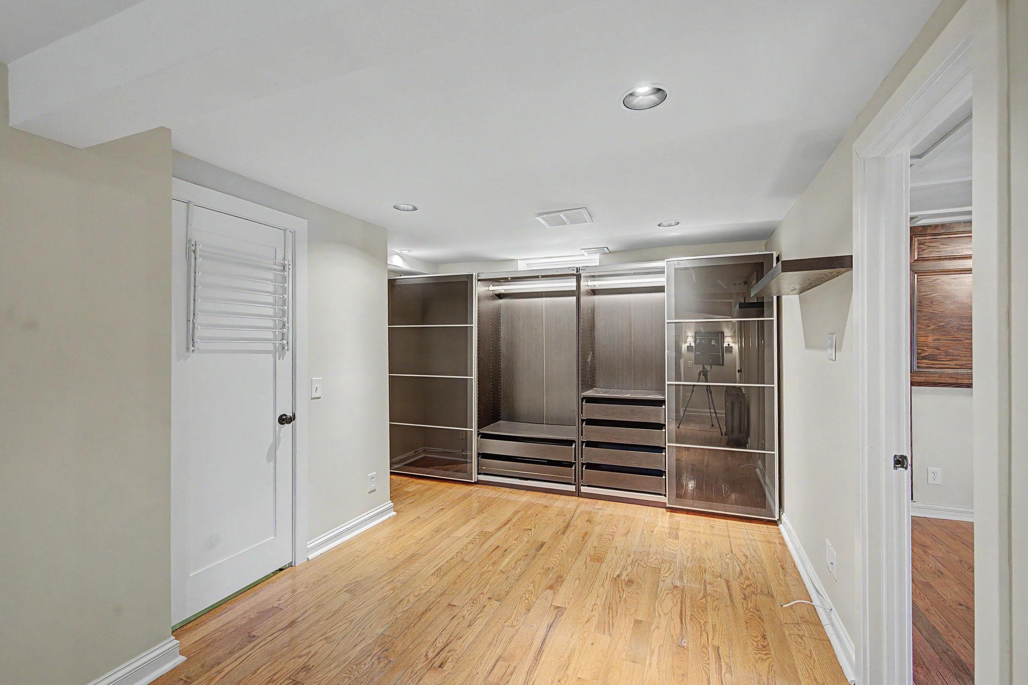 The lower level offers a versatile flex space—perfect for a cozy family room, media room, home office, or gym.