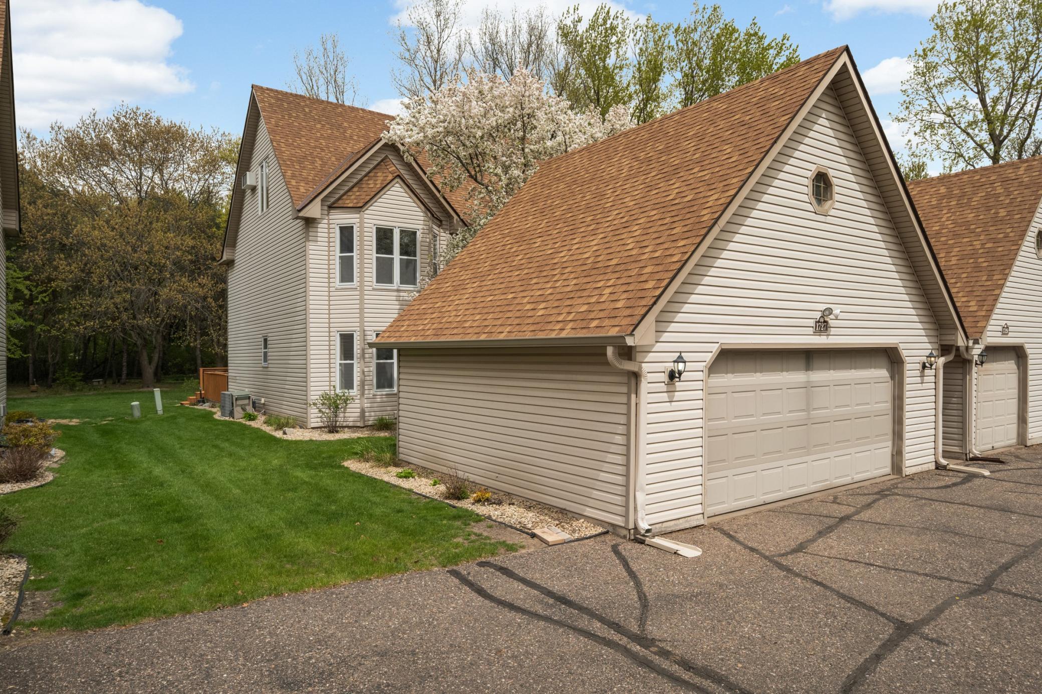 This end unit features a 2 car garage