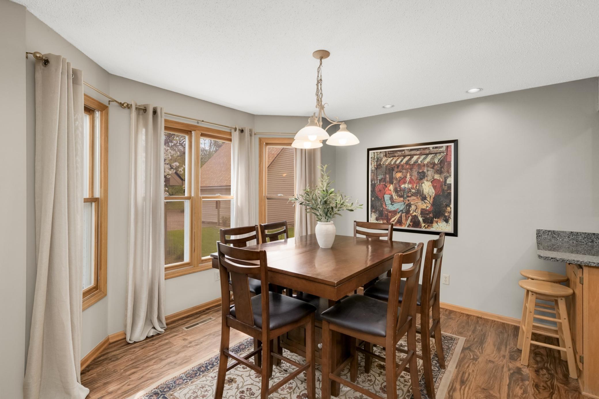 The bay windows let in great natural light. There is a breakfast bar as well.