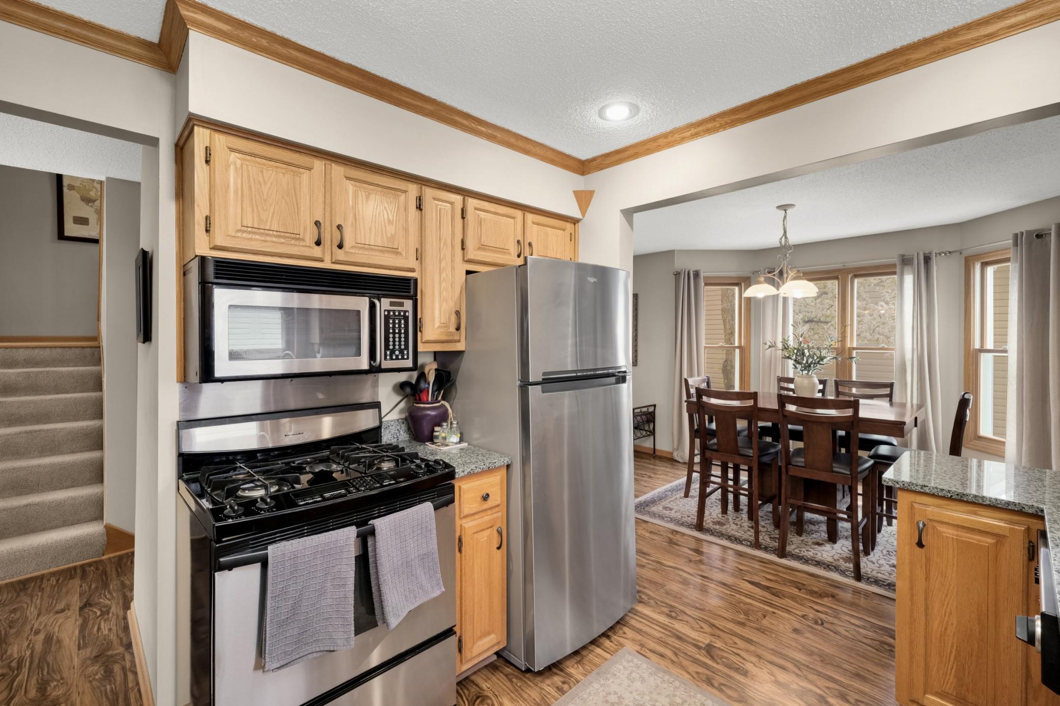 Laminate flooring runs throughout the space