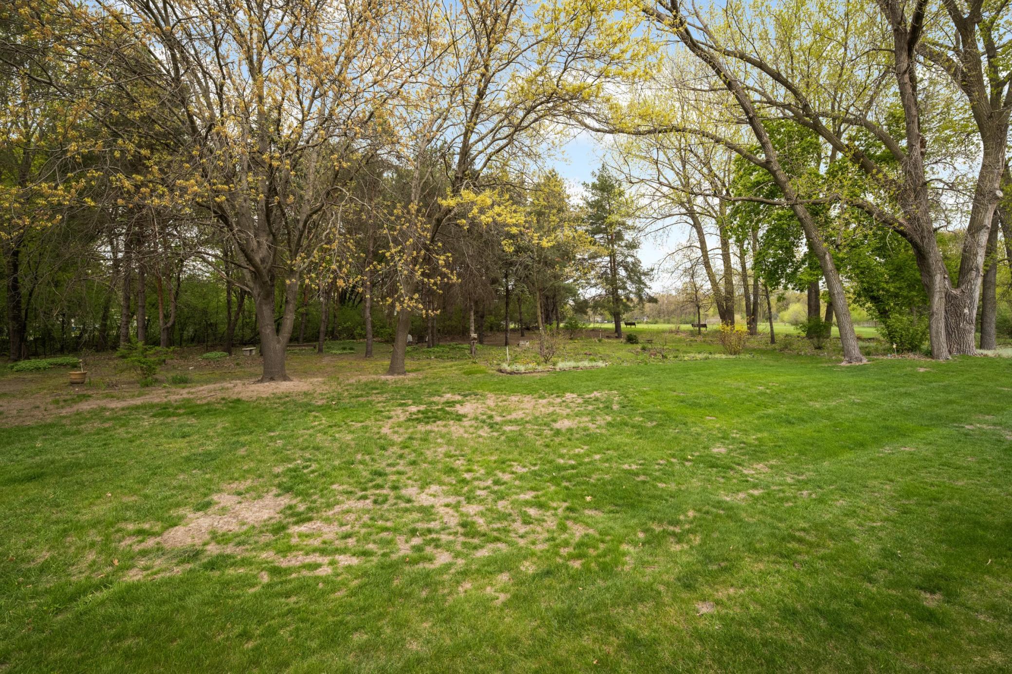 The huge yard area includes a shared garden.