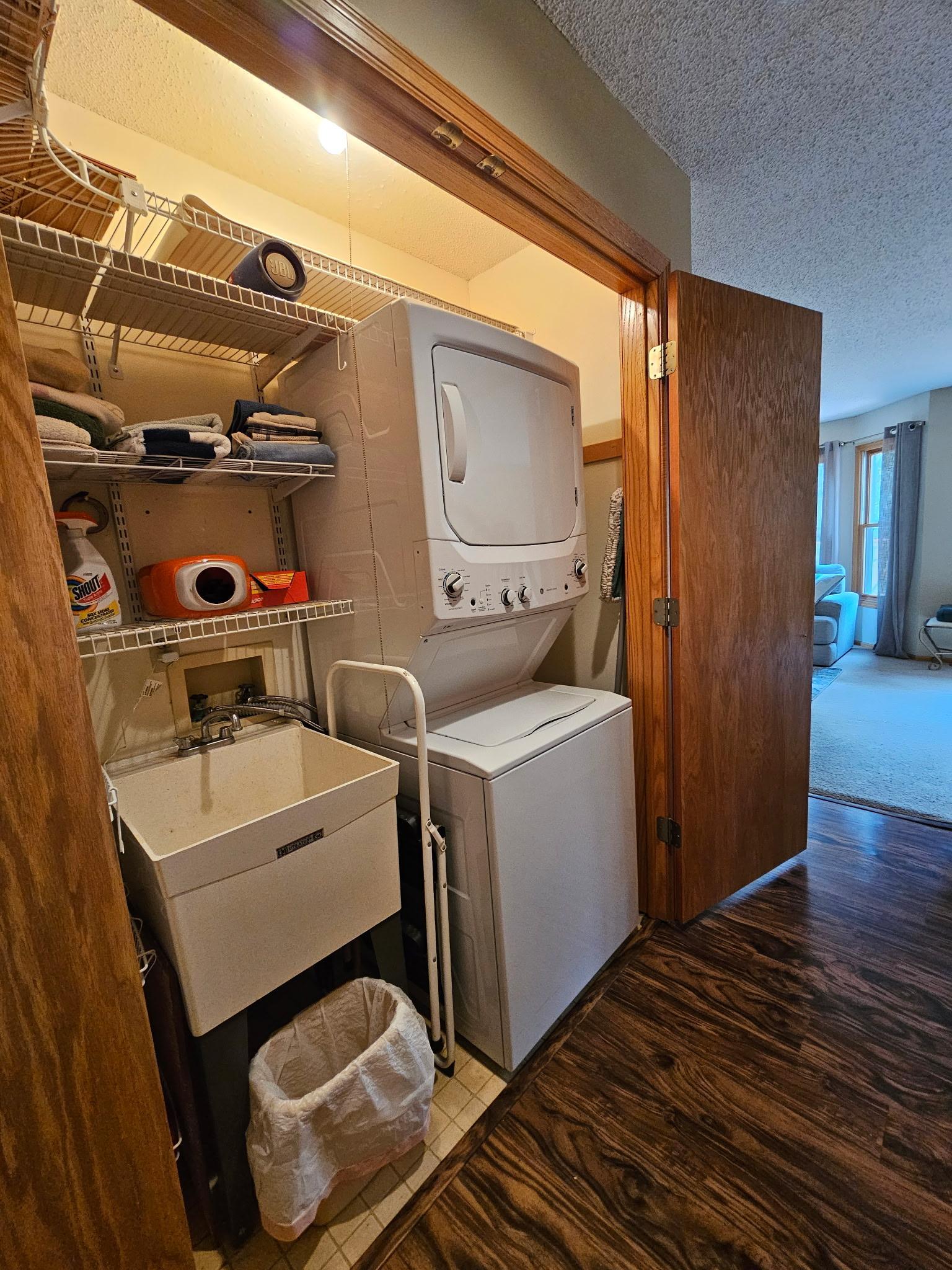 The main floor laundry includes a wash tub