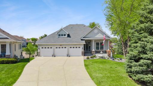 FIRST TIME AVAILABLE. Main level living in Waconia Landing. Custom built on .46 acre, lush landscaping surround w/mature trees. Steps to paved trails to walk to DT Waconia. Enjoy private day dock and beach on Lake Waconia. Heated, insulated garage