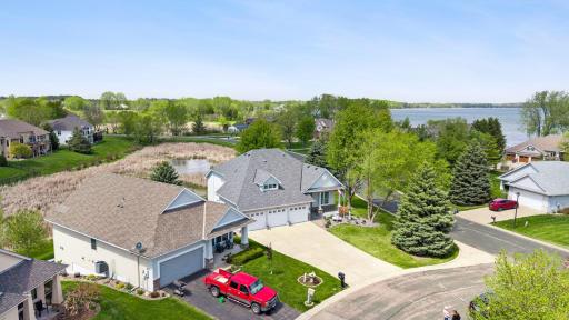 Largest detached villa in Waconia Landing 3746 FSF with custom features throughout! ML primary suite, sunroom off back, open floor plan on main and upper ideal to entertain.