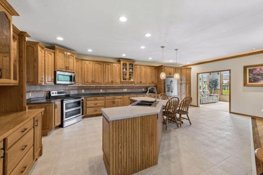 See detail sheet online for all custom features. Custom cabinetry throughout with incredible kitchen open to all to enjoy the flow when you have guests. Buyers will appreciate and enjoy all the built-ins throughout home.