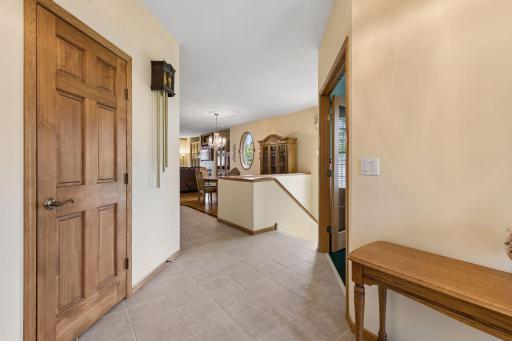 Welcome to your new home. Spacious entryway to gather and greet your guests with front hall closet and main level office on the right with glass French doors