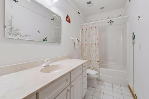 Full lower bath with heated tile floors which is such a nice luxury to have in a bathroom.