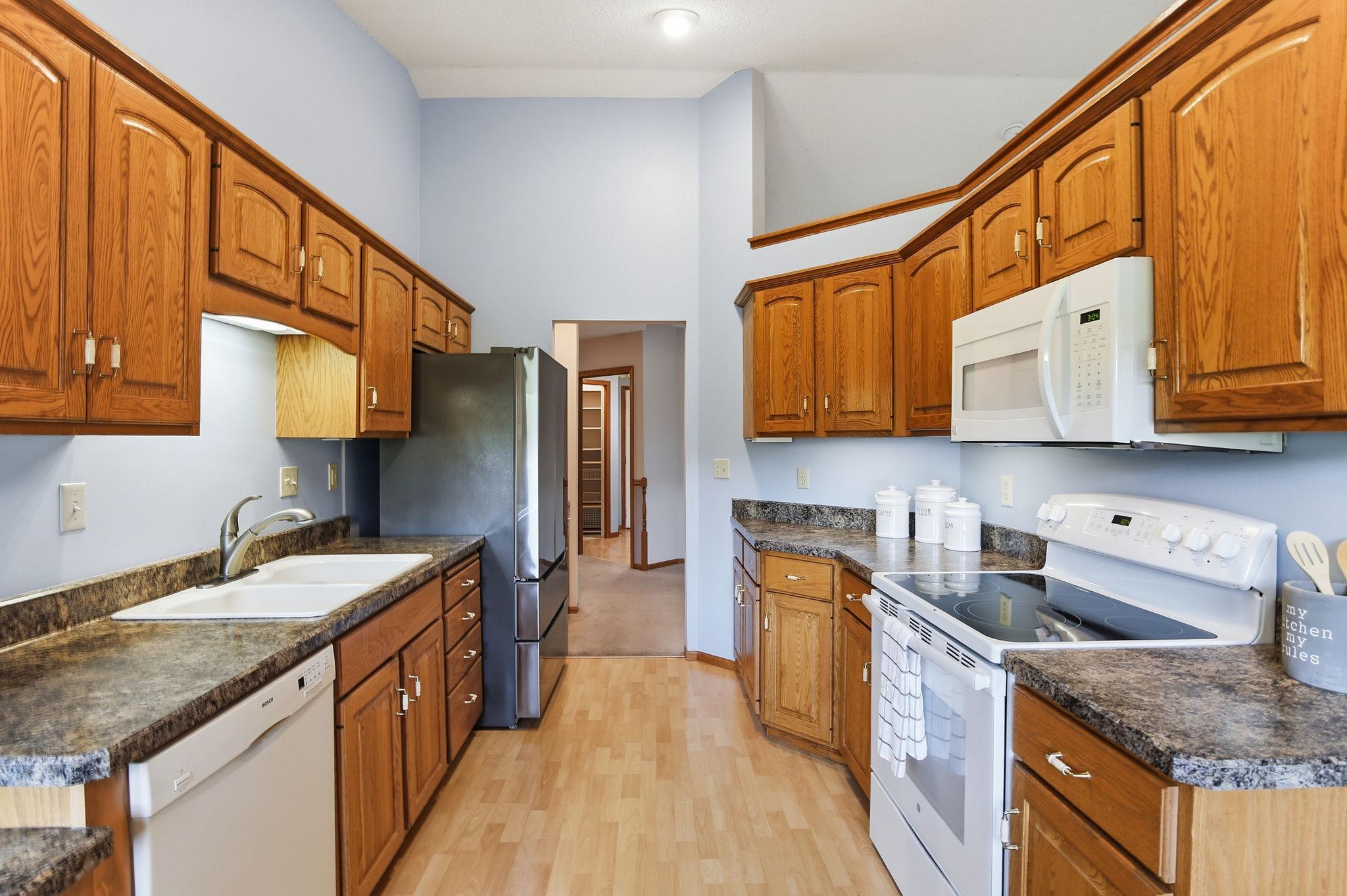Vaulted Kitchen with Great Cabinet Space & Breakfast Nook.