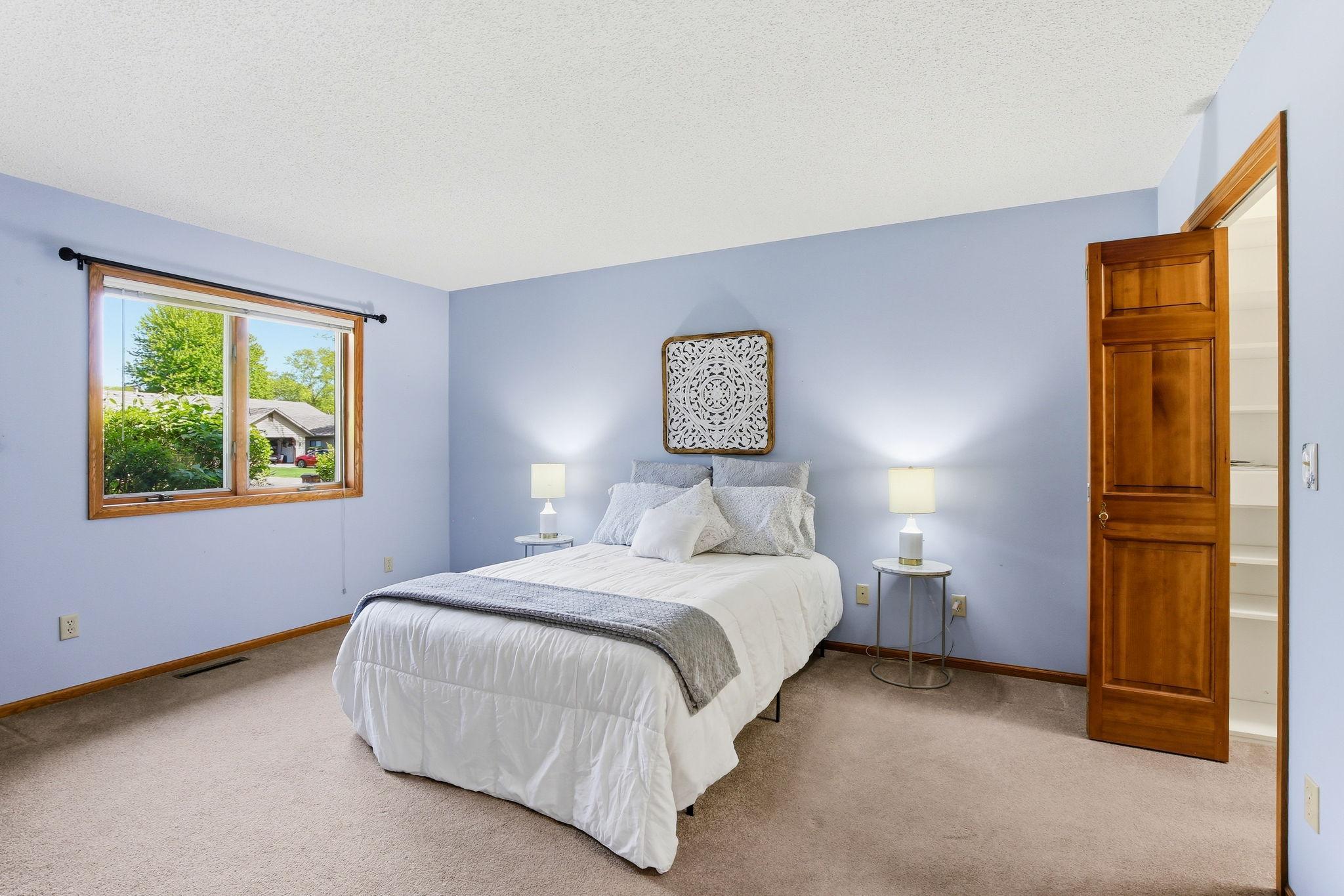 Spacious Primary Bedroom with Walk-In Closet & Private Bath.