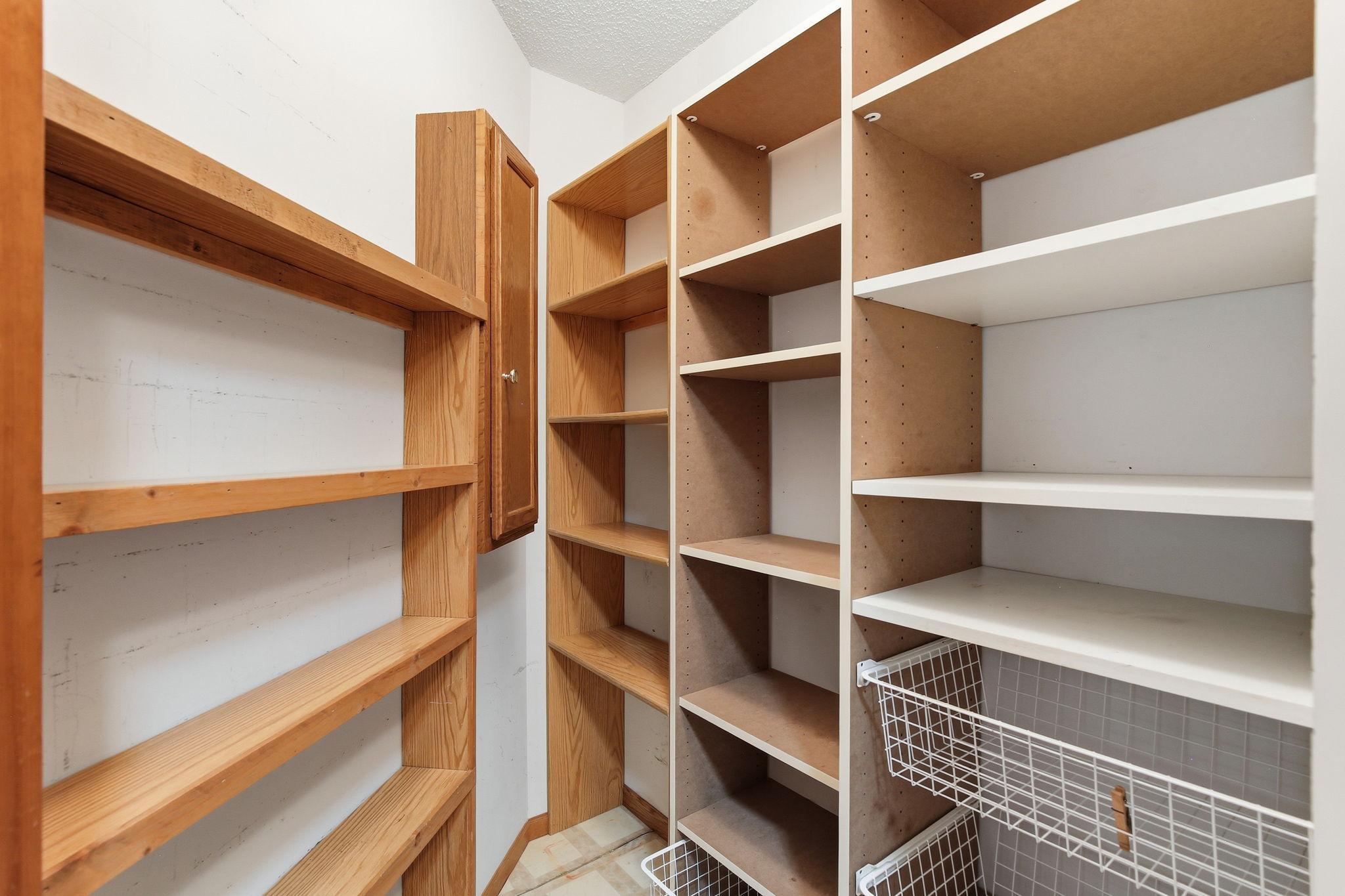 Closet to be used as a pantry off the laundry room.