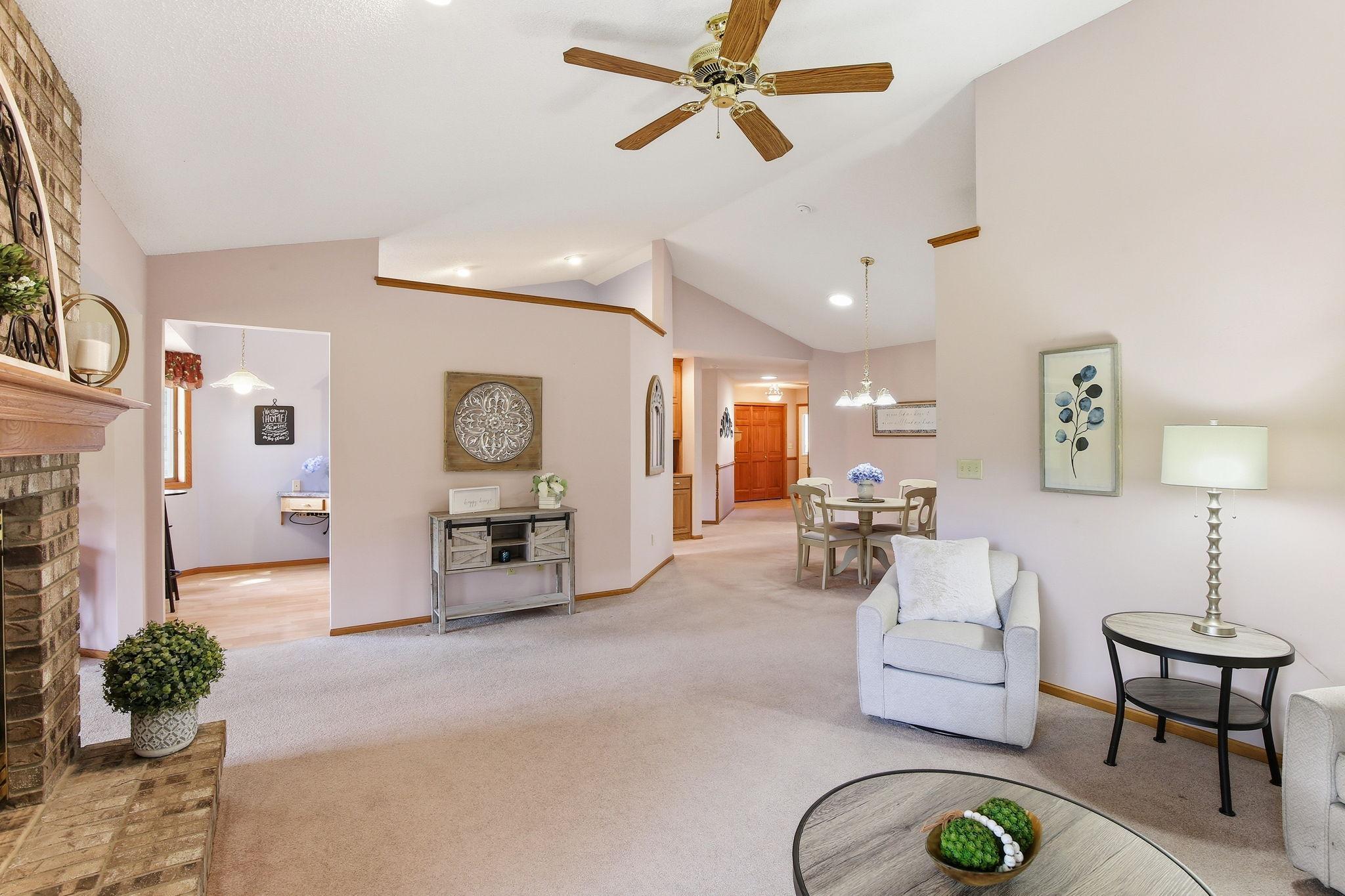 Open Vaulted Floor Plan Connecting the Living Room, Kitchen & Dining Room.