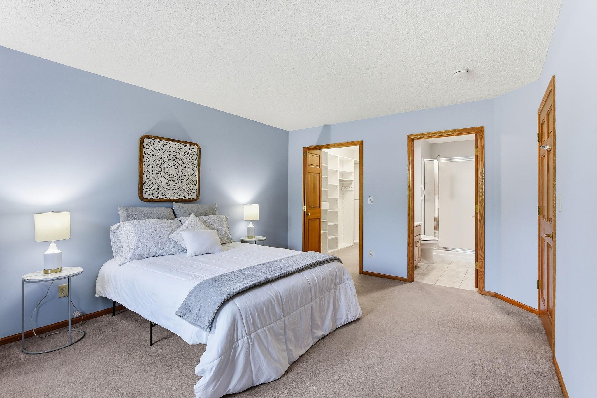 Spacious Primary Suite with Private Bath & Walk-In Closet.