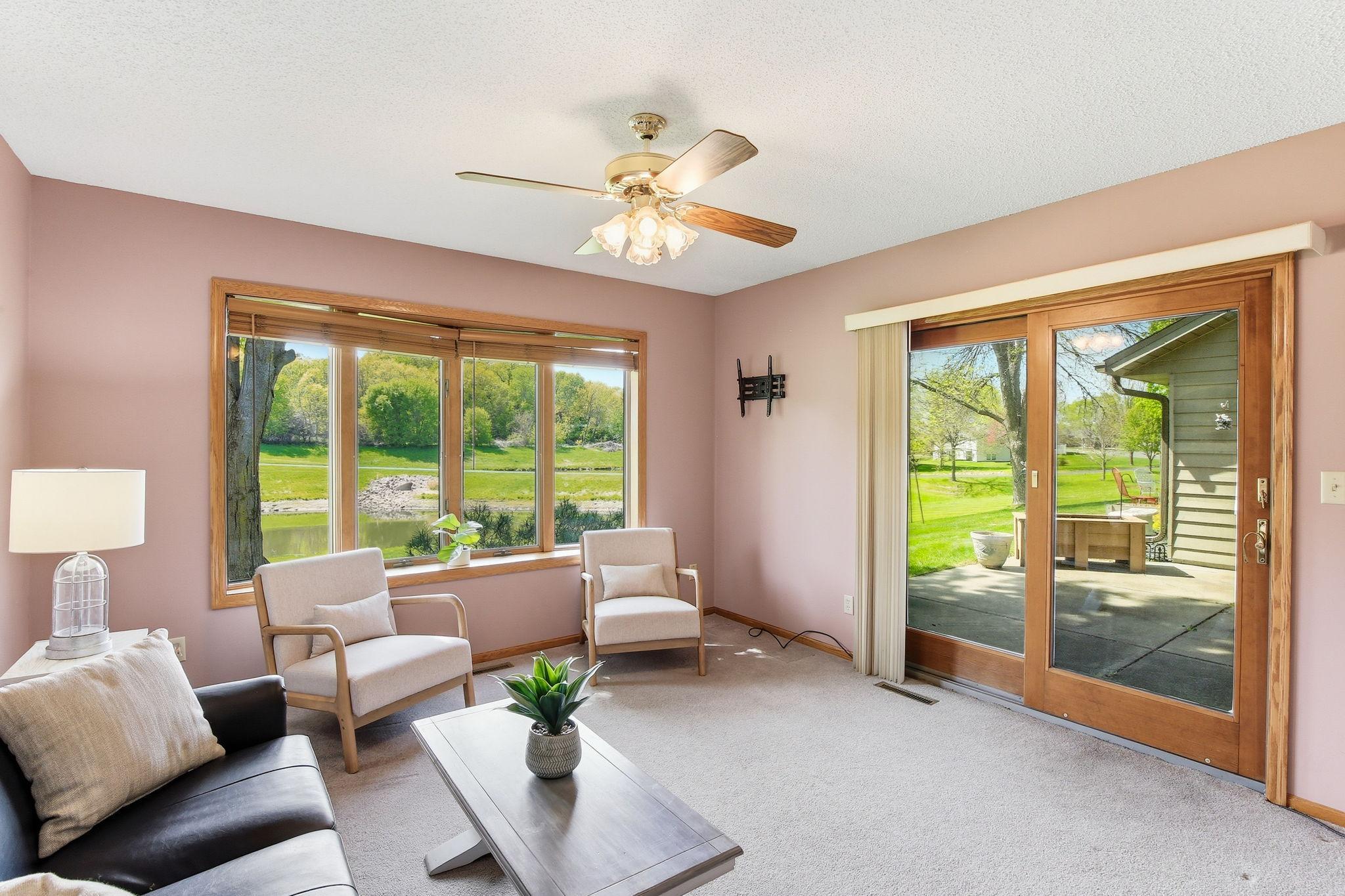 Sunroom with Patio Door Leading to the Private Patio.