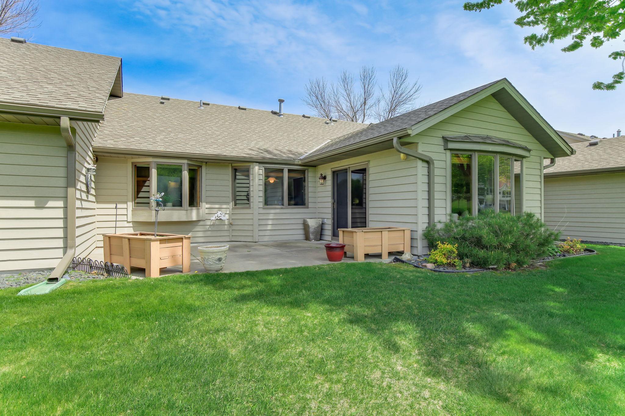 View of the back of the home and patio.