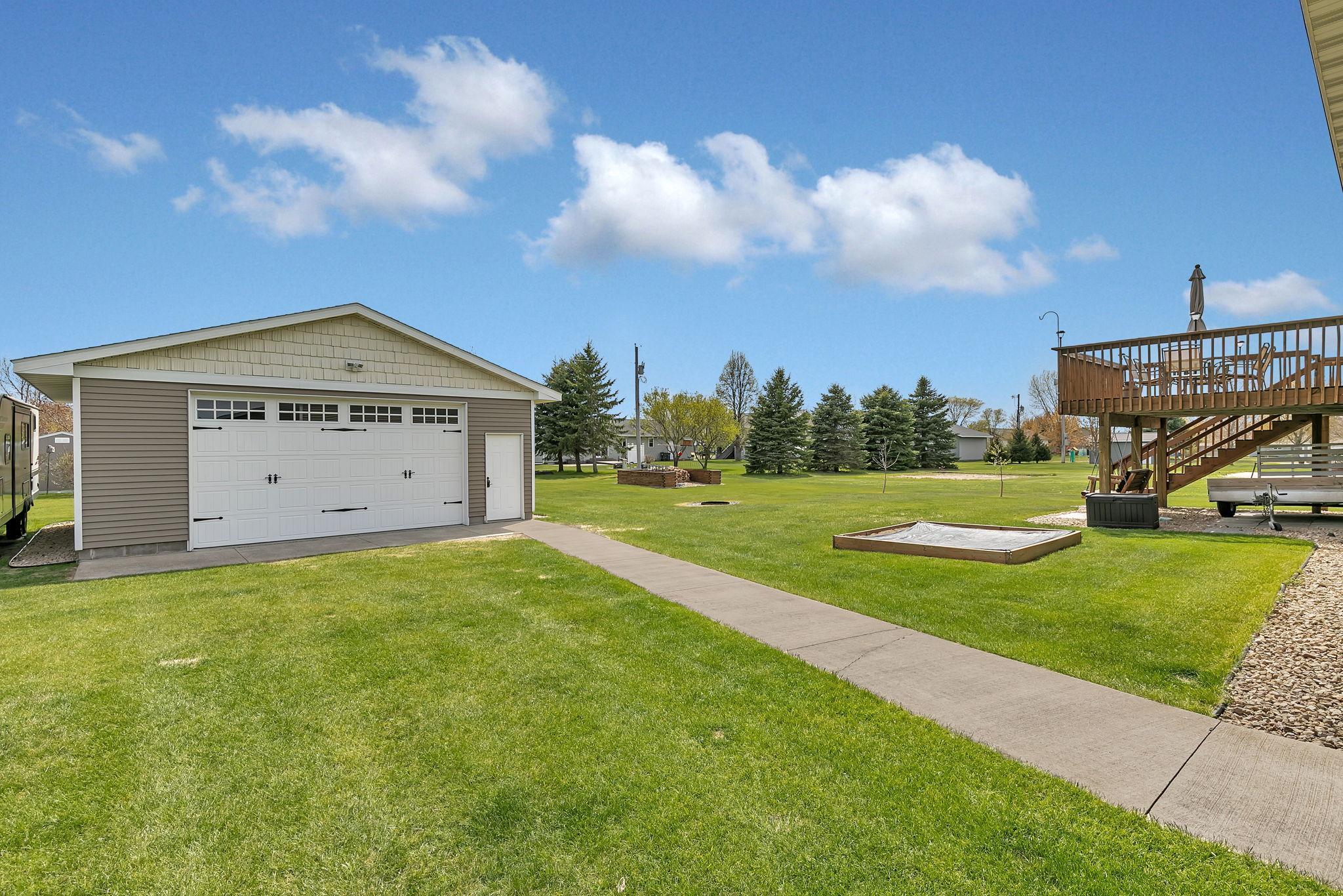 26x24 detached forced air heated garage with 100amp sevice!