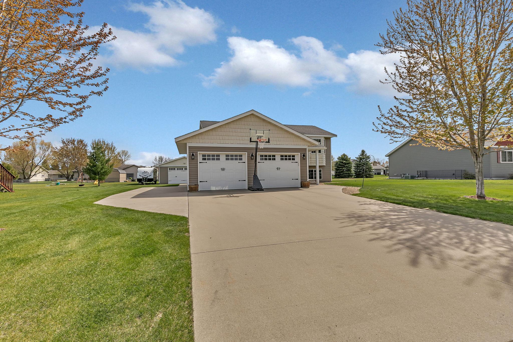 Ample parking! 2 stall attached garage, extra parking pad