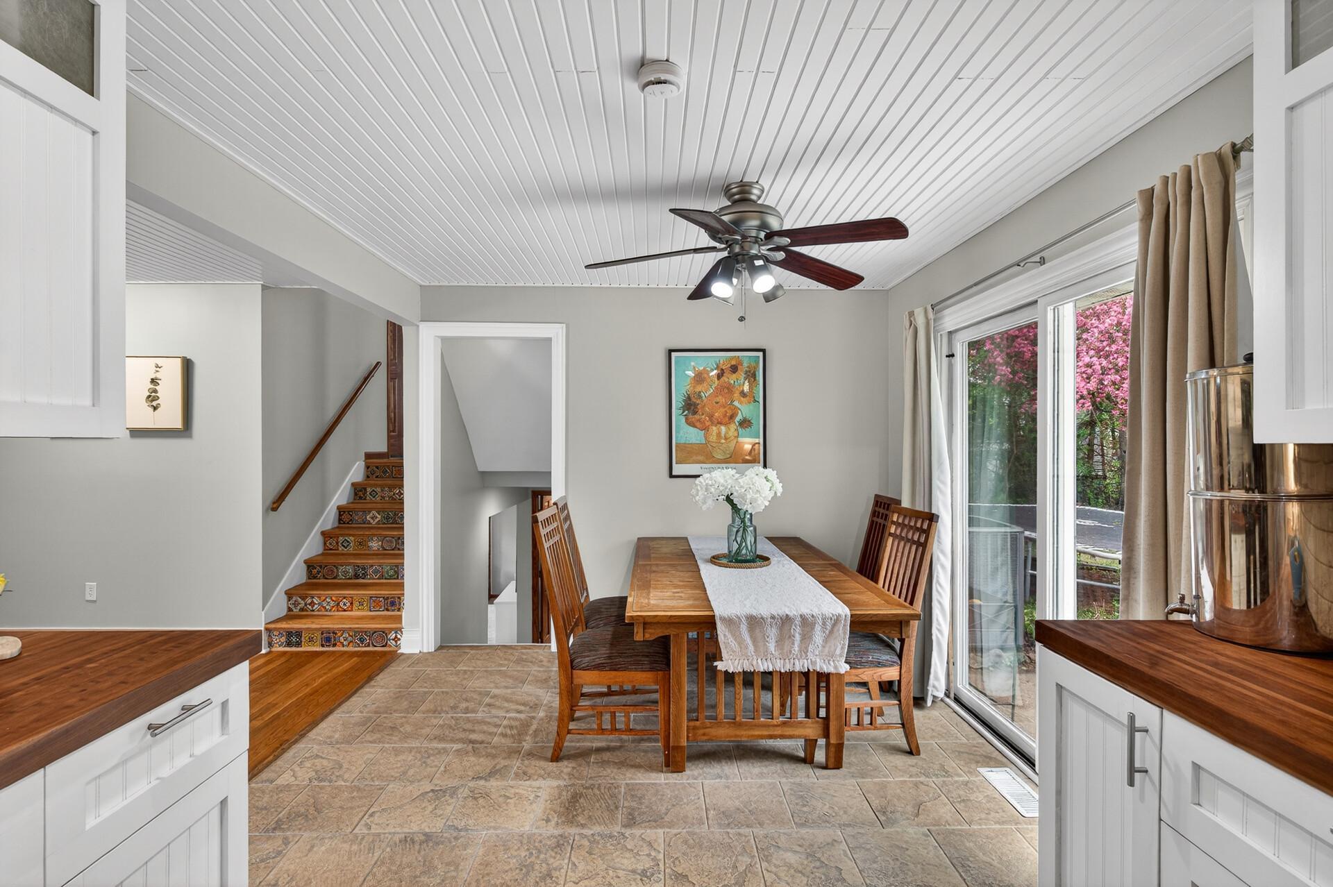 Sliding Doors to Large Backyard and Patieo