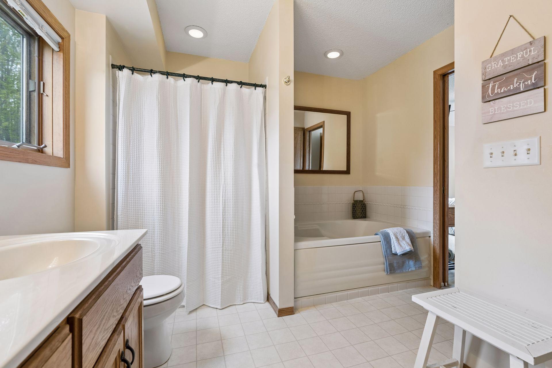 Spacious layout offers a separate tub and shower along with additional room to move comfortably throughout the space.