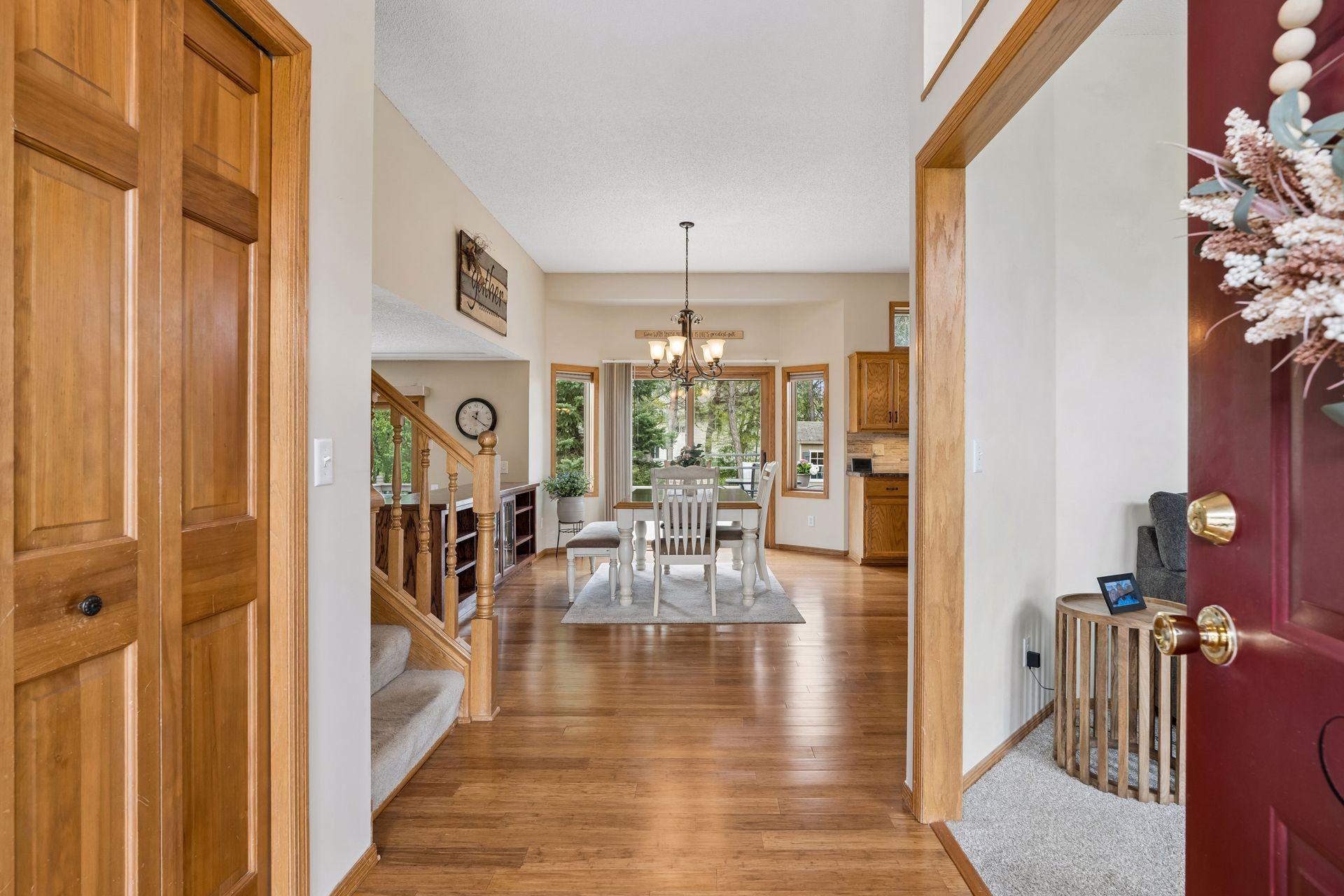 Inviting view from the front entry showcasing the open layout and warm, welcoming feel of the home.