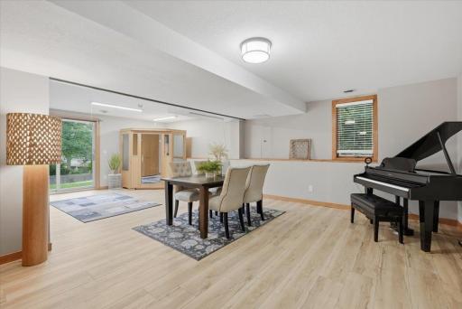 Lower level features a fully open area perfect for dining, living and much more!