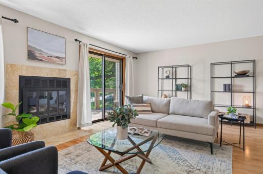 Access large, rear deck right off living room. A unique feature for a townhome!.jpg