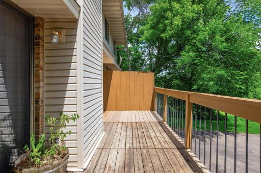 A deck the full width of the property looking east.