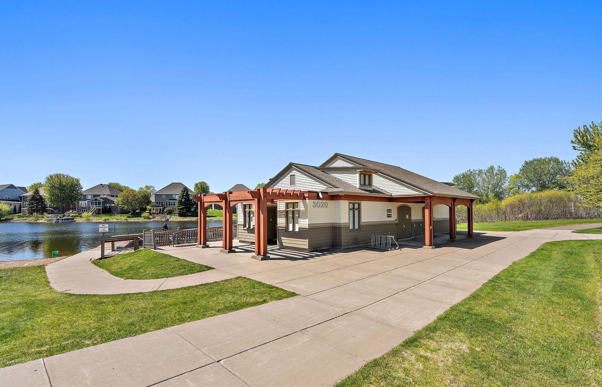 The park is well-equipped with a modern, permanent restroom building that matches the pavilion's aesthetic, along with additional seasonal portable options to handle larger summer crowds.