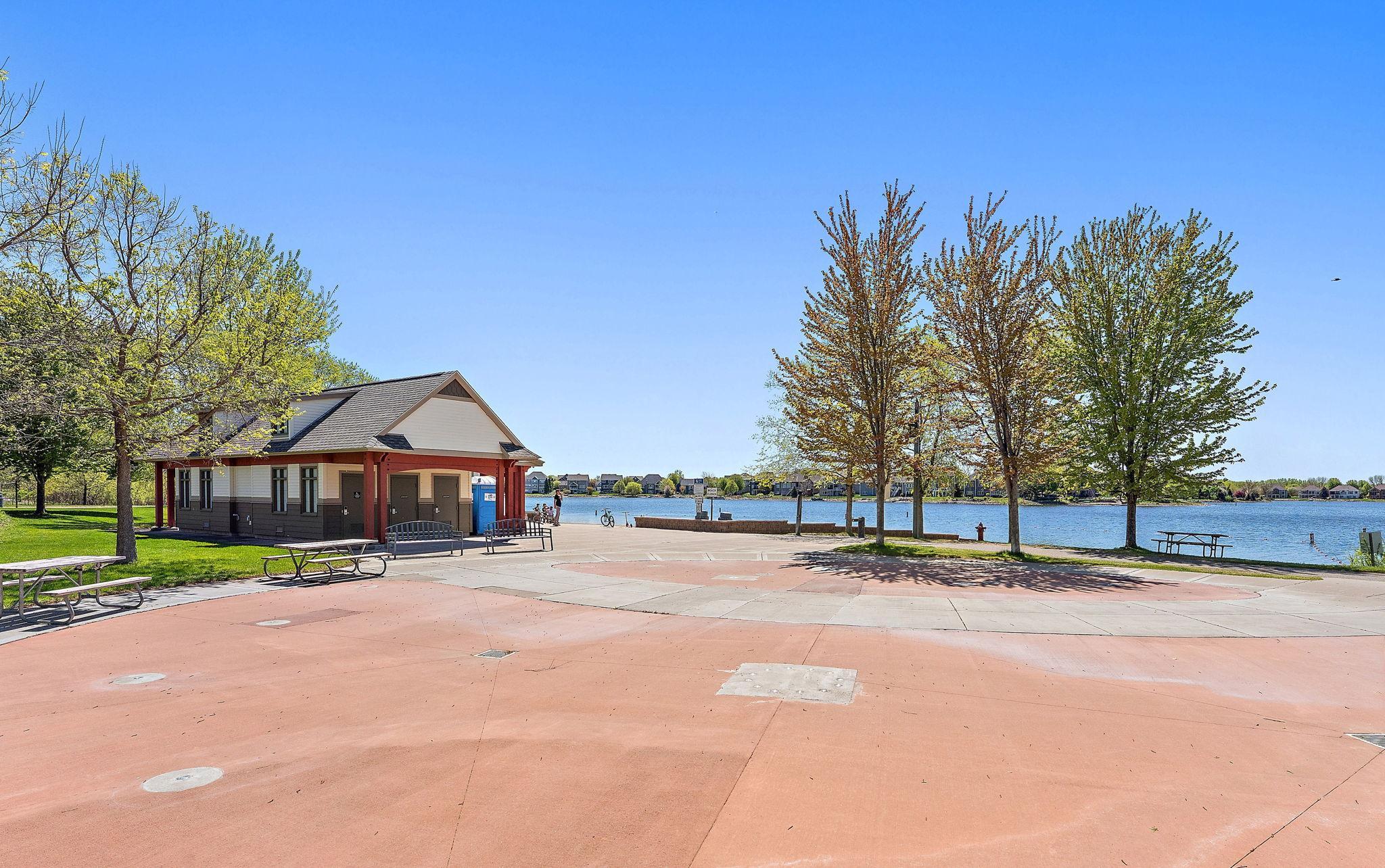 Don't miss the splash pad area is surrounded by benches and young trees. It’s a perfect spot for kids to cool off away from the deeper lake water.