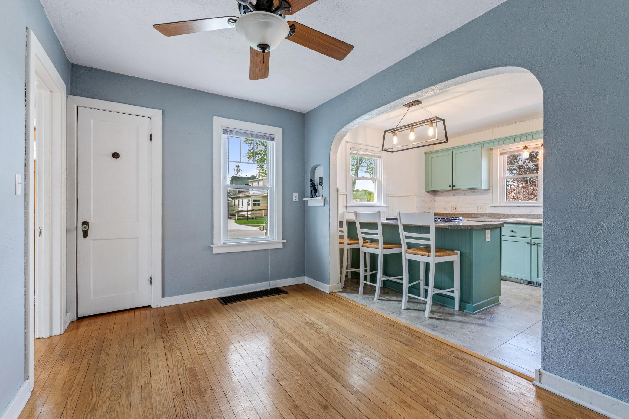 This dining room expands the kitchen to make room for guests to come over.