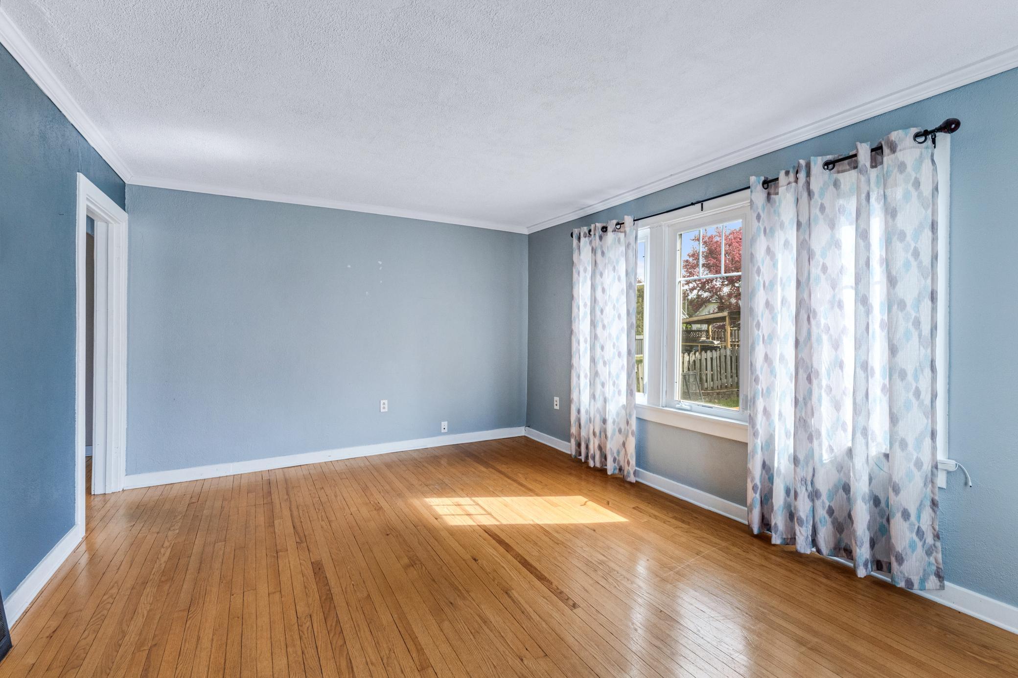 Gleaming wood floors, ready for your furniture pieces