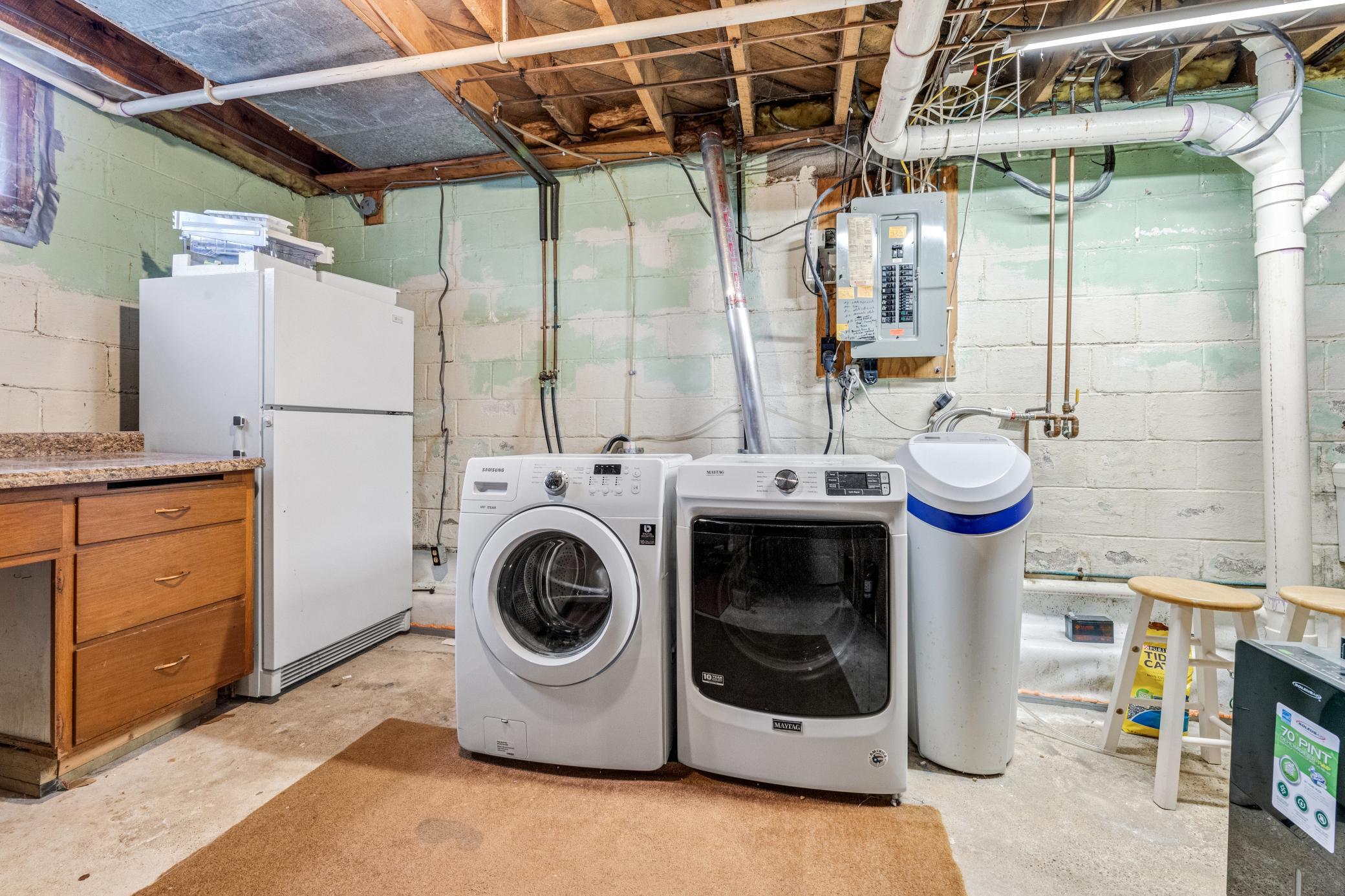 Laundry and workbench in the lower level -