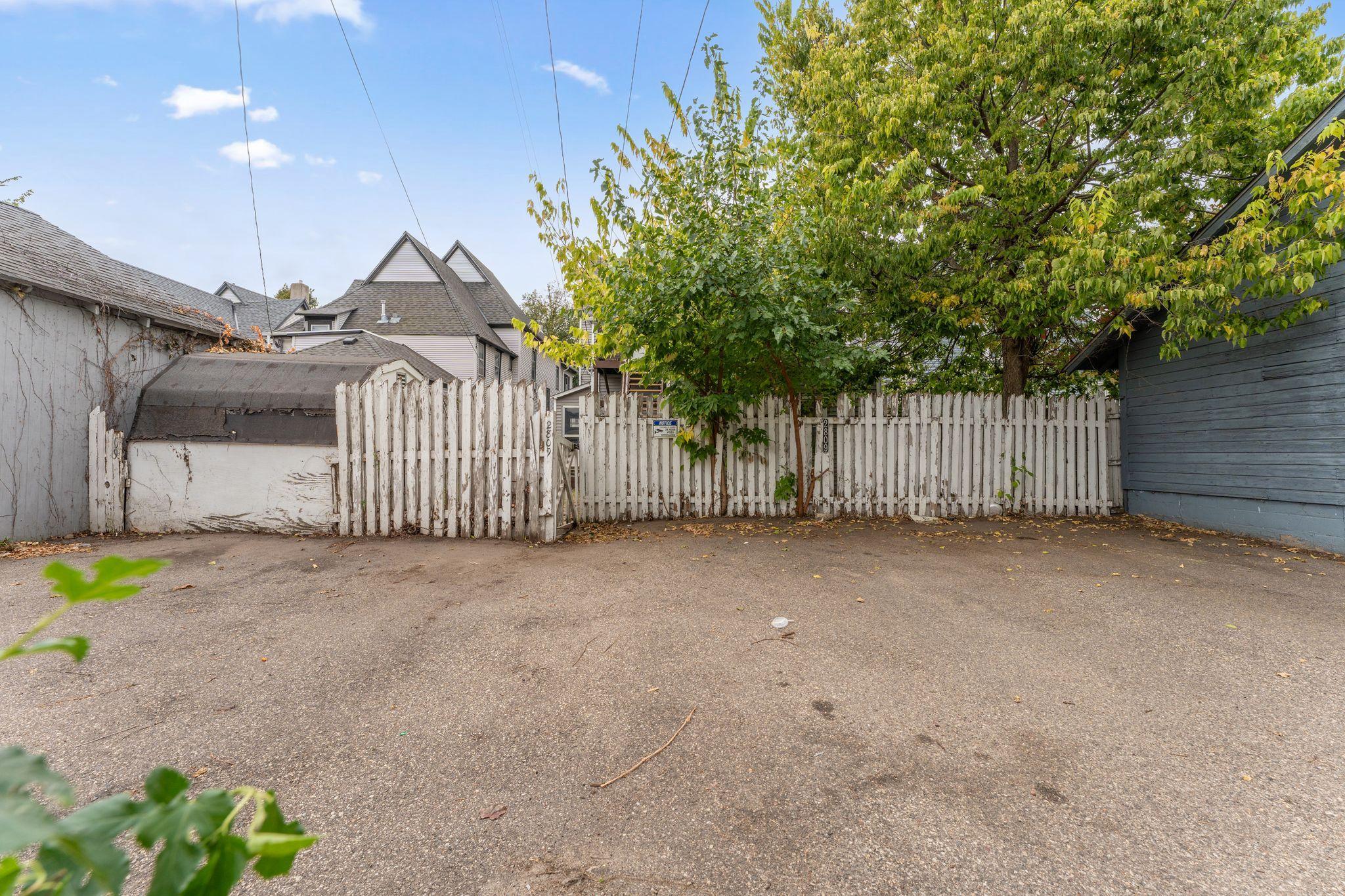 4-car parking area in rear of property