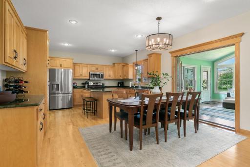 Open kitchen and dining area that flows into the sun room.