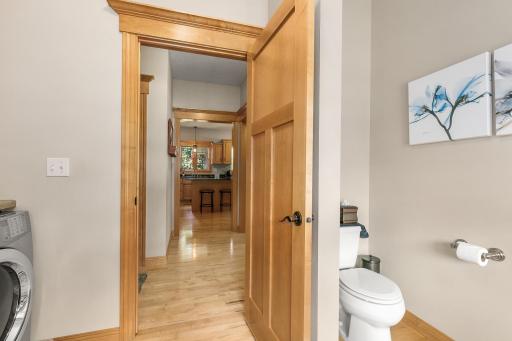 The laundry room also acts as a half bathroom on the main floor.