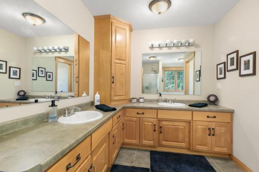 Double vanity with ample under storage space.