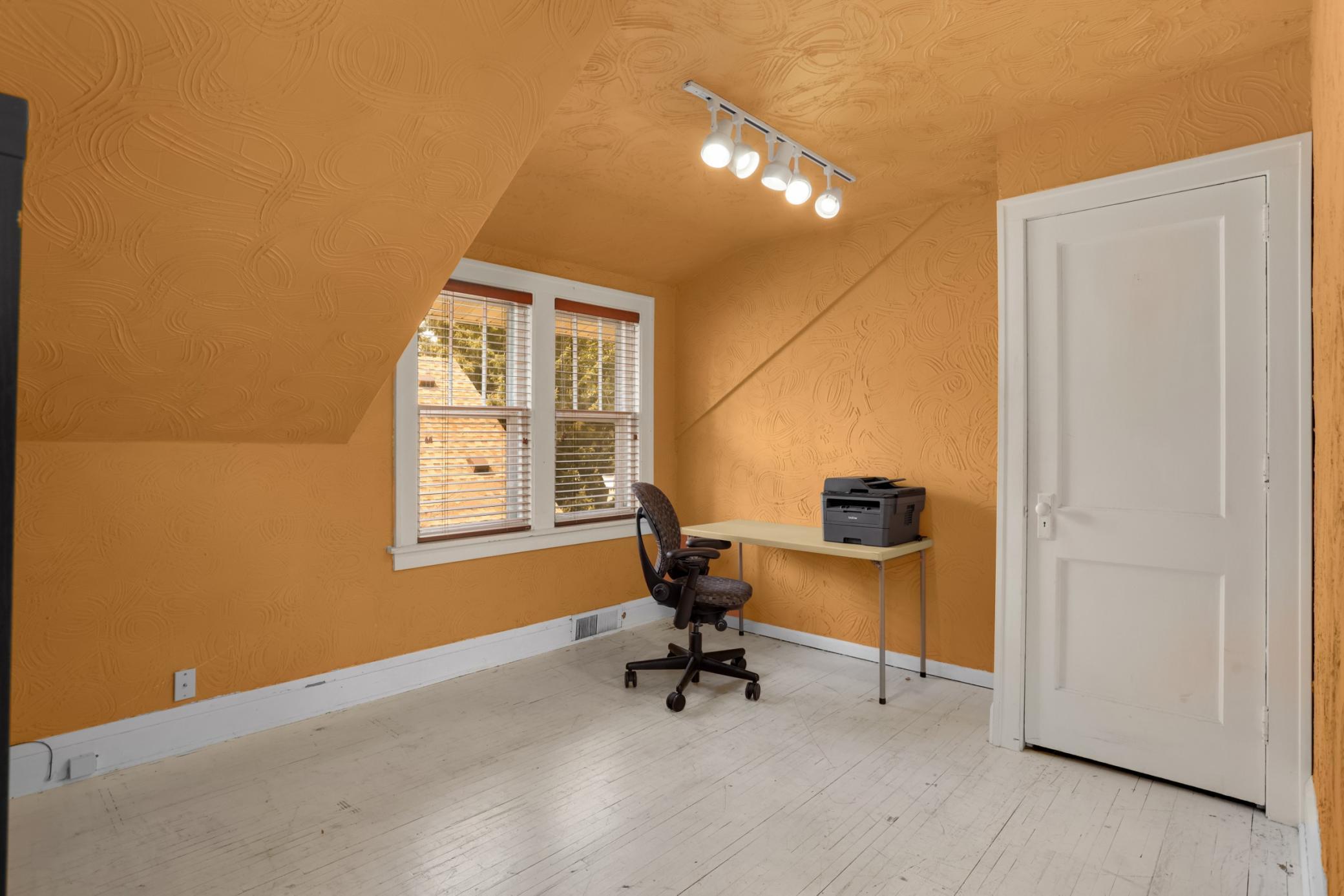 Upstairs bedroom #2 being used as office.