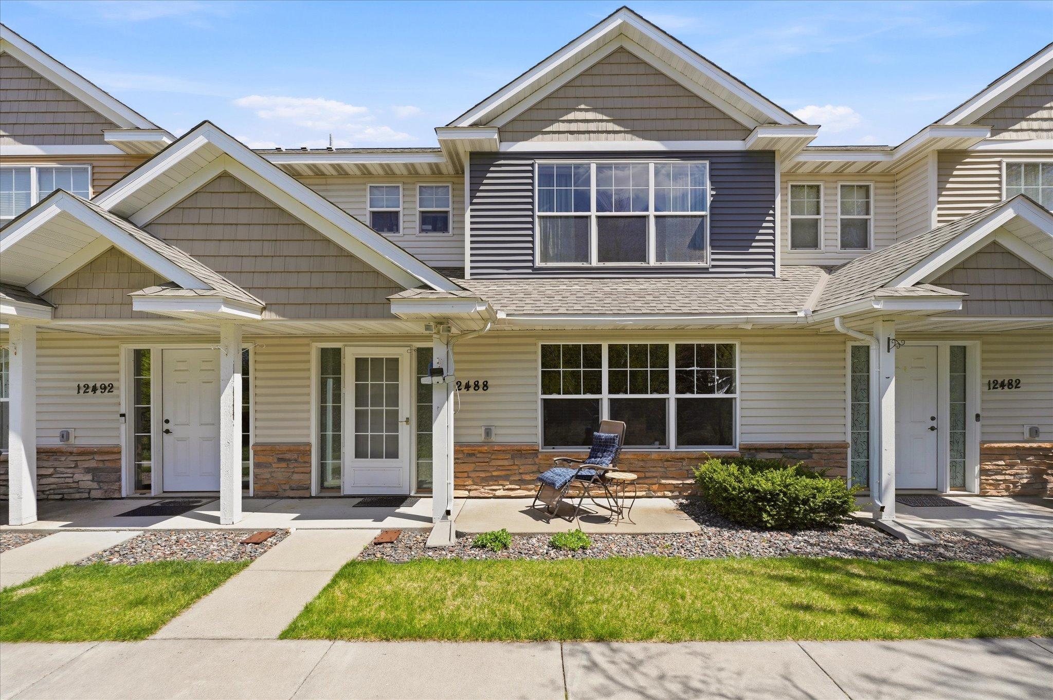Beautifully maintained townhome with attractive curb appeal, and a peaceful setting.