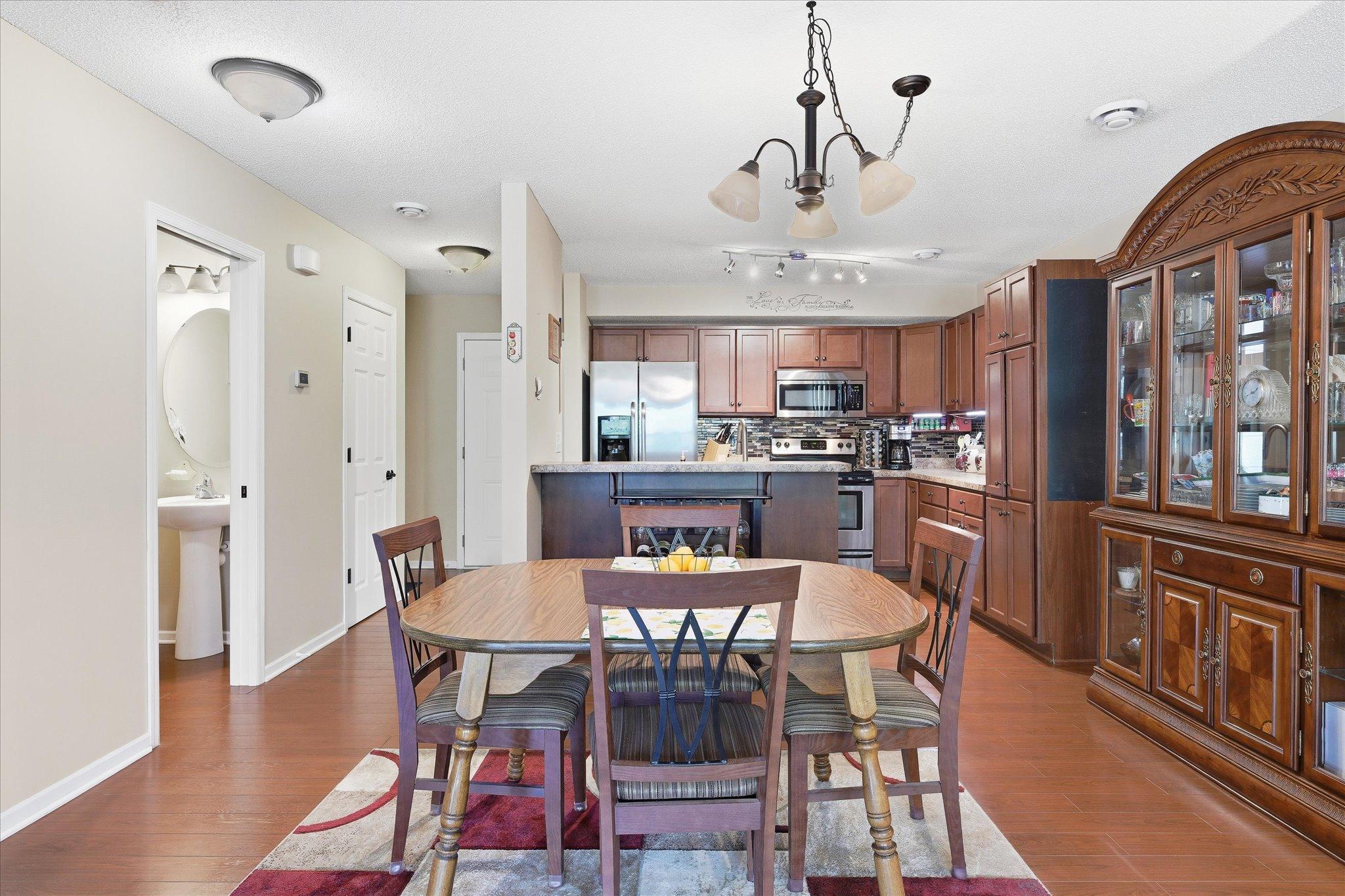 Bright and functional kitchen featuring convenient breakfast bar seating.