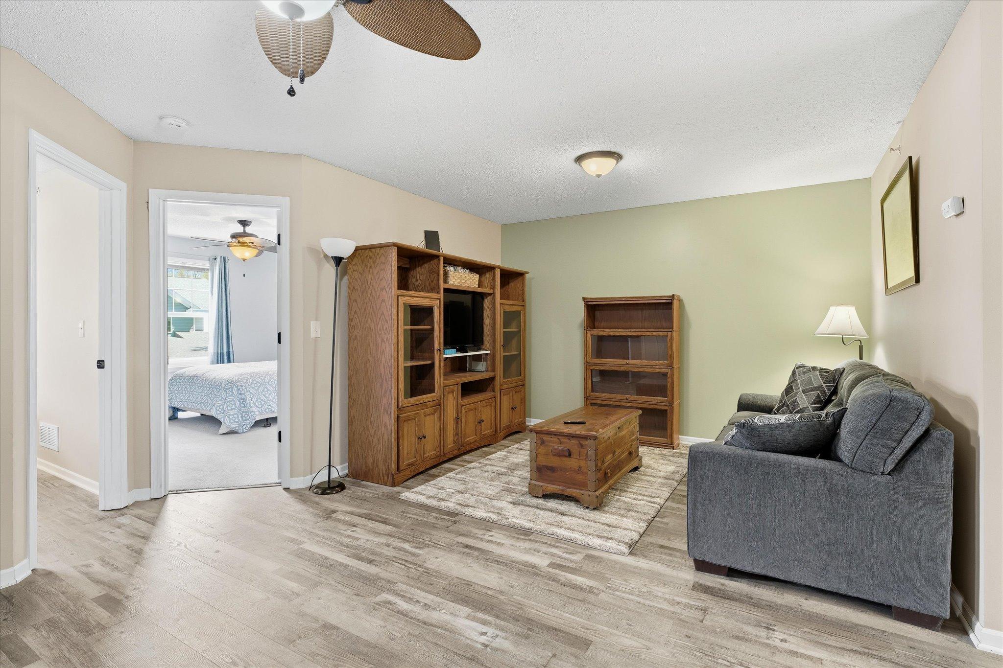 Versatile upper-level loft/family room offering the perfect space for a second living area, office, or media room.