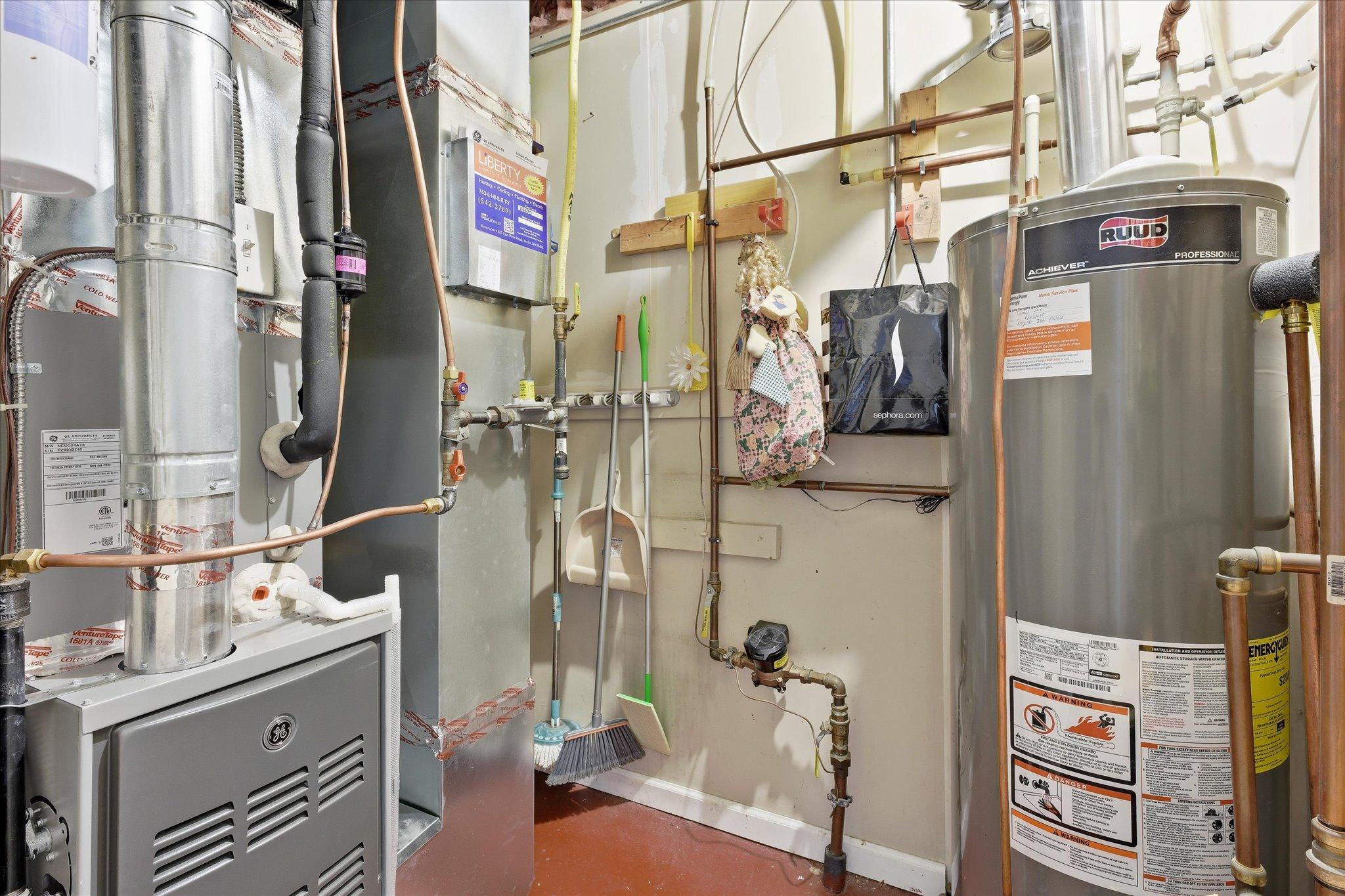 Utility room featuring updated mechanicals, including new furnace and A/C in 2025 and water heater replaced in 2022.