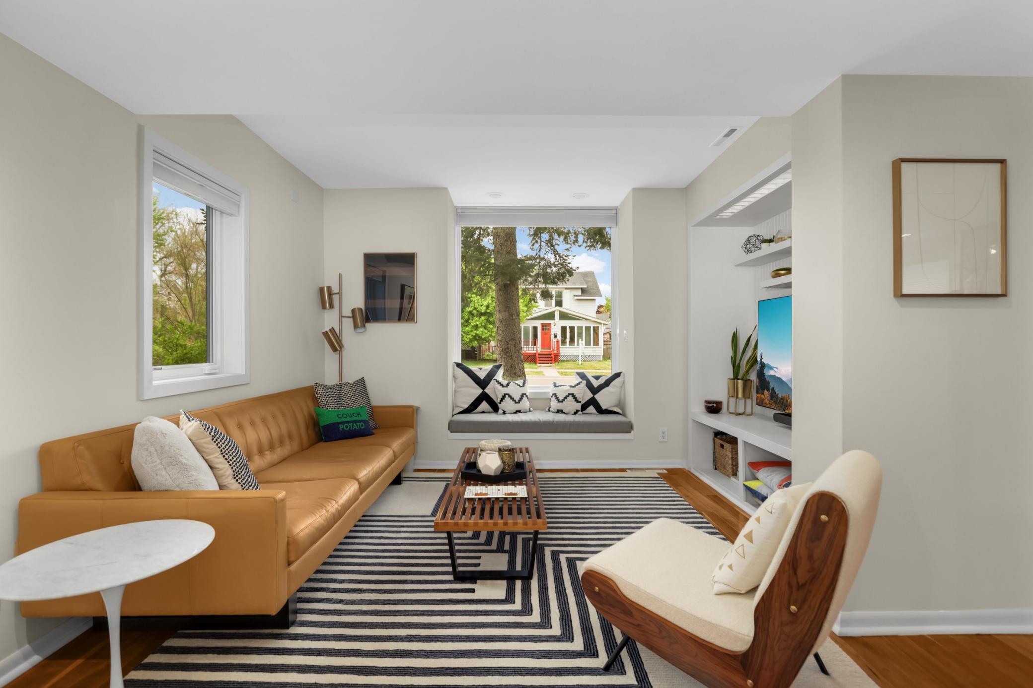 Den in front of house
