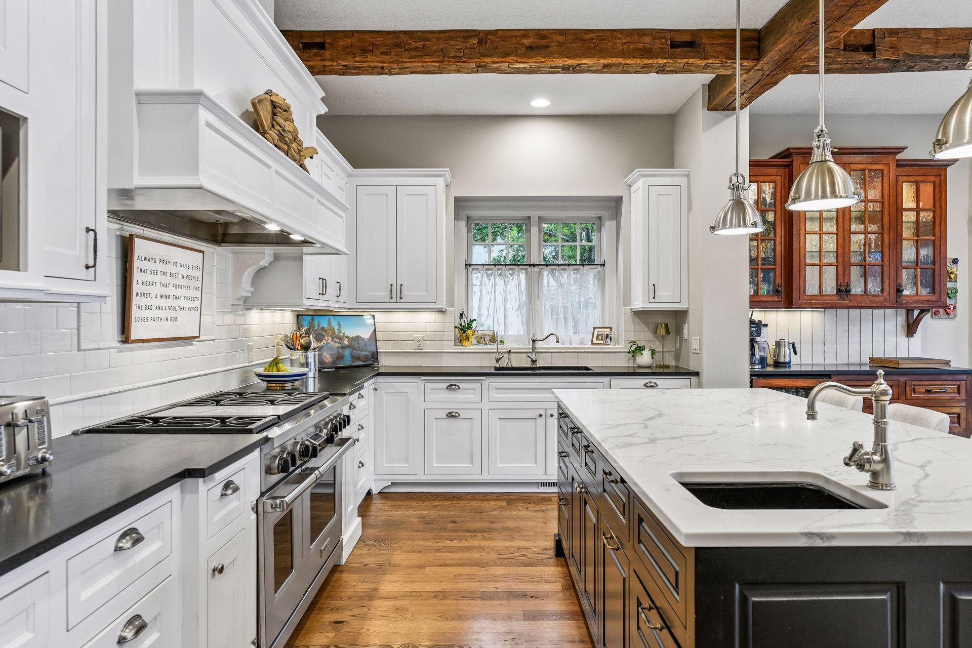 Well-equipped, the kitchen features professional appliances from Wolf, Sub-Zero and Bosch.