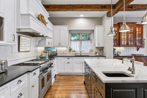 Well-equipped, the kitchen features professional appliances from Wolf, Sub-Zero and Bosch.