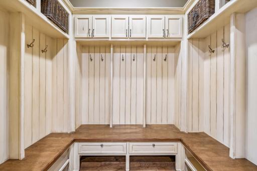 The Mud Room features extensive built-in lockers with drawers, cubbies and cabinets so that every boot and mitten has a home.