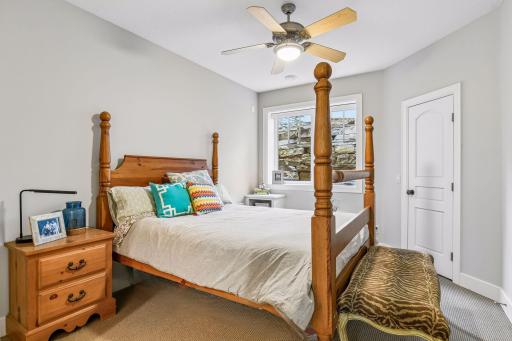 Each bedroom enjoys high ceilings and large windows.