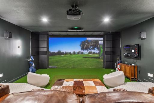 Enjoy a state-of-the-art Golf Simulator with padded turf flooring and tiered theatre seating making this ideal for movie night or perfecting your swing.