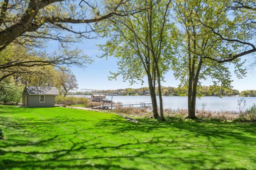 The level lawn provides the perfect place to splash in the water at the sandy shoreline or launch your paddleboard for a day on the lake.