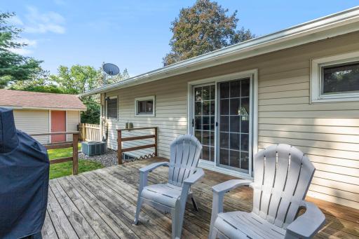 The nice 0deck overlooks the back yard